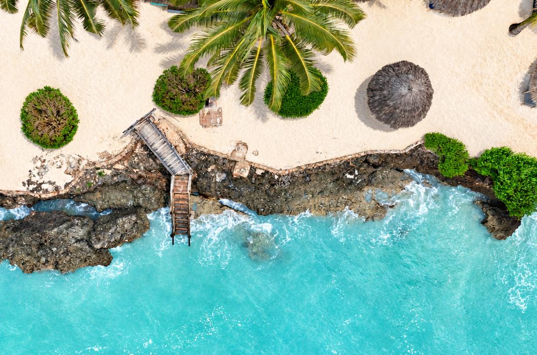 The resort's beach and shoreline from above